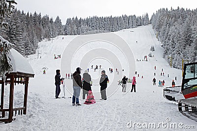 Kids skiing on a ski slope for children in winter resort in mountain of Vitosha, Bulgaria â€“ jan 23,2018. Skiing, ski sport Editorial Stock Photo